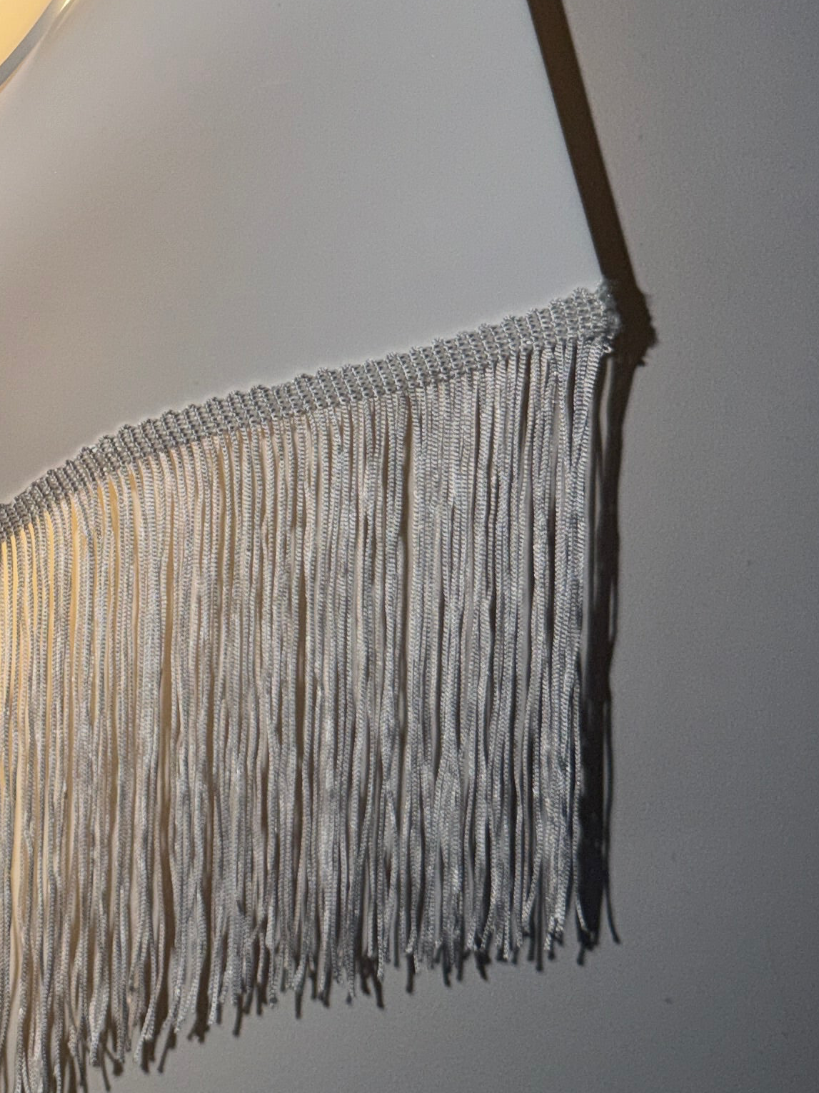 Tassel heart wall sconce
