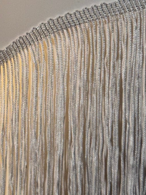 Tassel heart wall sconce